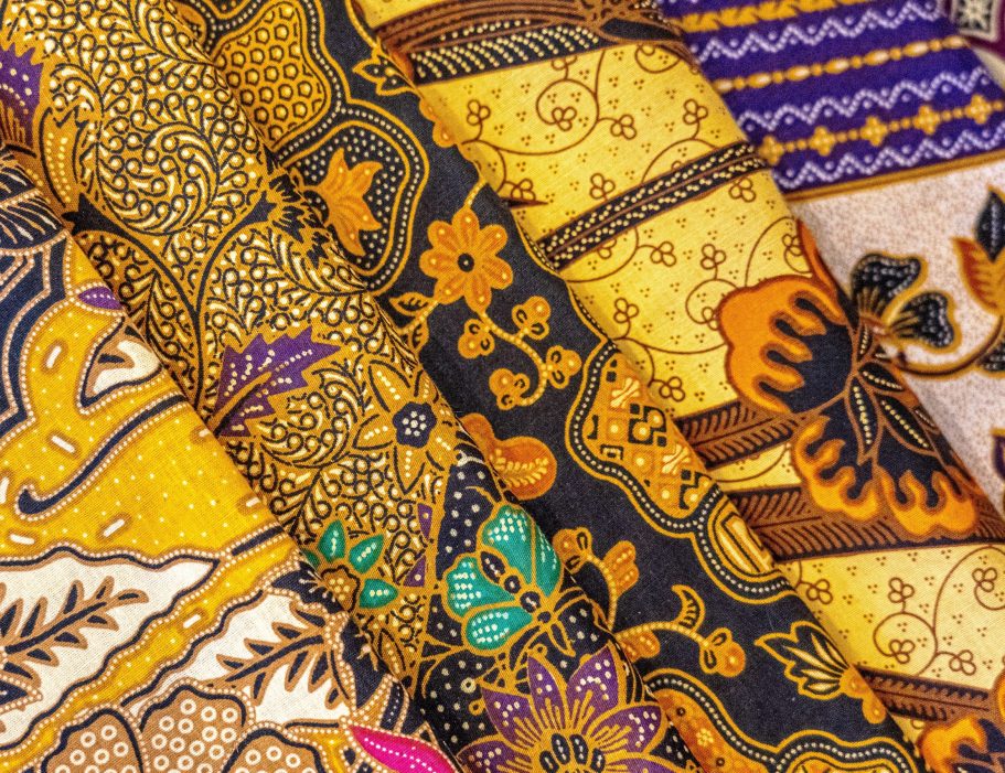 high angle closeup shot of colorful textiles with beautiful asian patterns